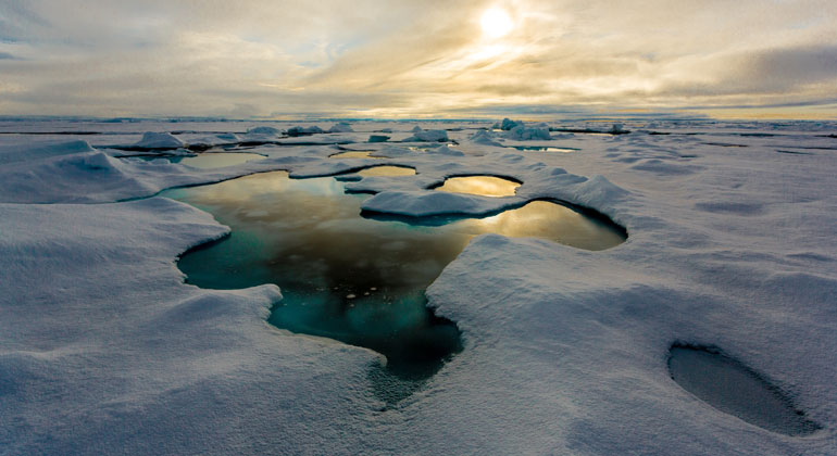 awi.de | Stefan Hendricks | Melt pond on Arctic sea ice in the Central Arctic.