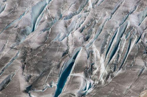 FAU/Christian Sommer | Glacial crevices filled with meltwater in the lower regions of the Great Aletsch Glacier in summer 2019.